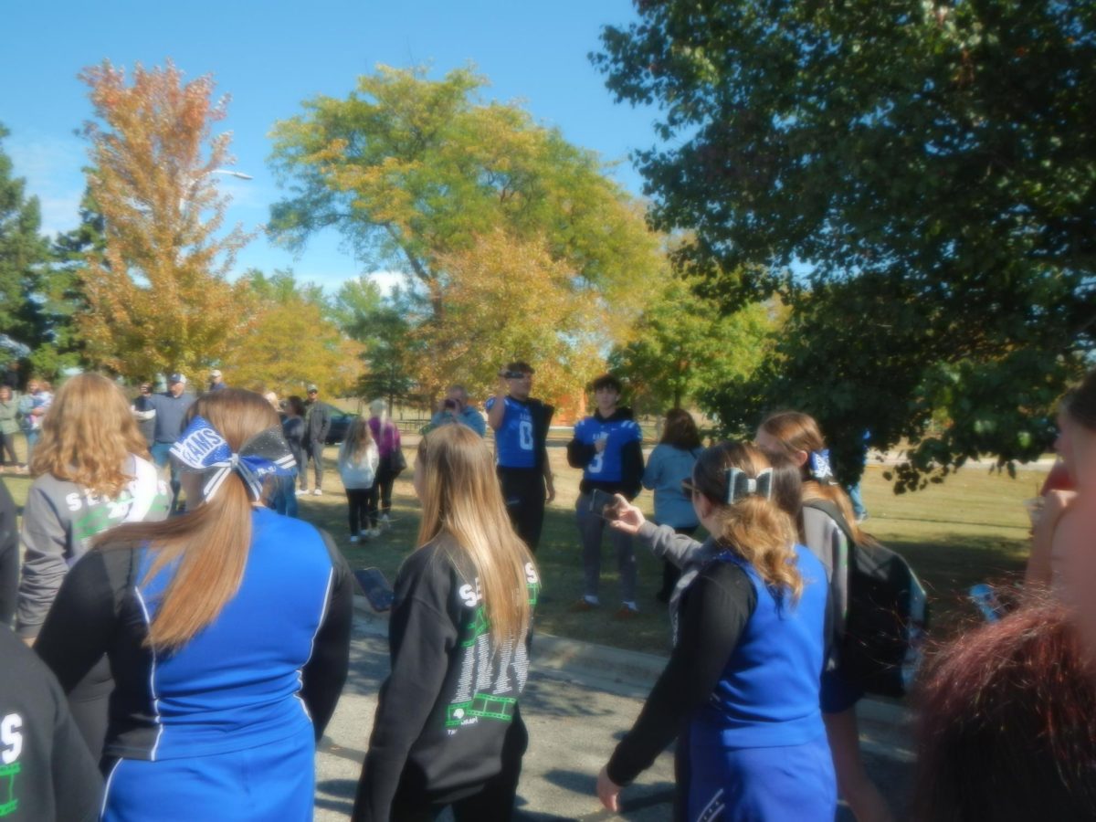 Seniors beginning their walk to the field during the Pep Rally