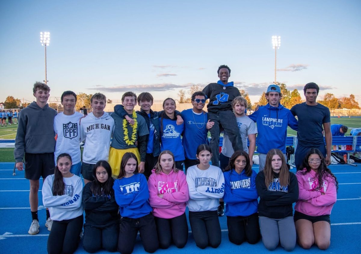 Cheerleaders (missing Nathanial Vitro and Griffin Didur) and the cheer coaches.
