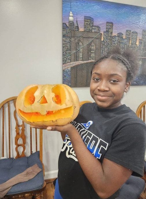 Cianna Nixon at team bonding with her pumpkin
