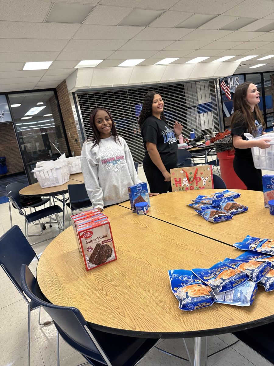 Shaniya Allen waiting at the sweet treat table.