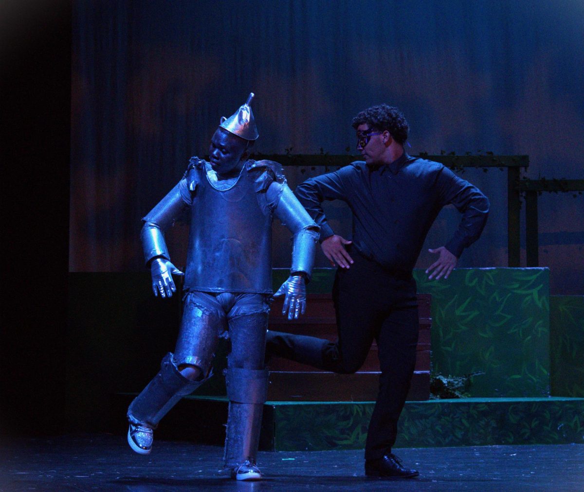 Troy Hill and Jordan Aaron dancing the Jitterbug in The Wizard of Oz.
