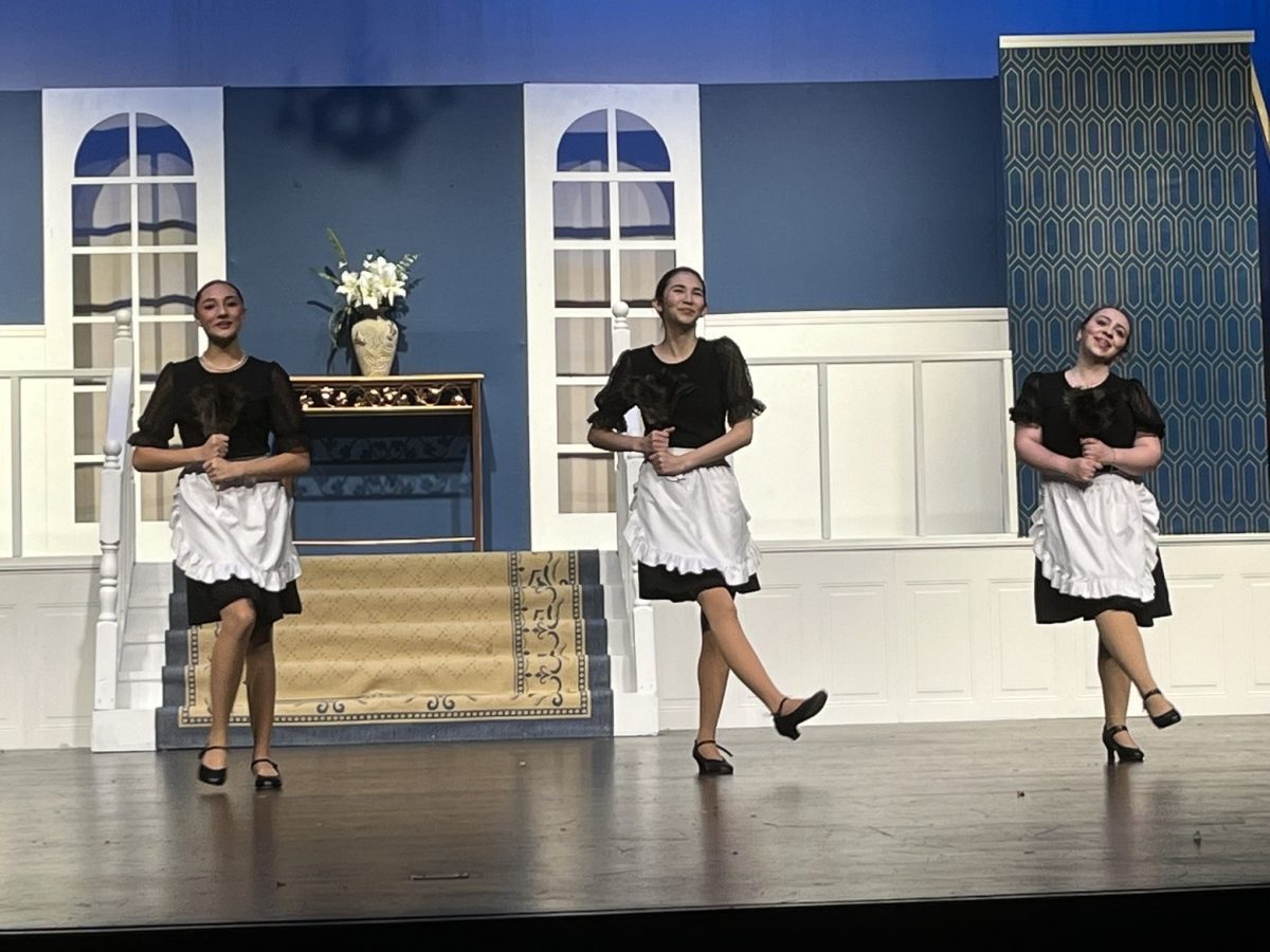 Kyleigh Cabral, Sophia Minowa, and Amelia Jones as the dancing maids in Annie